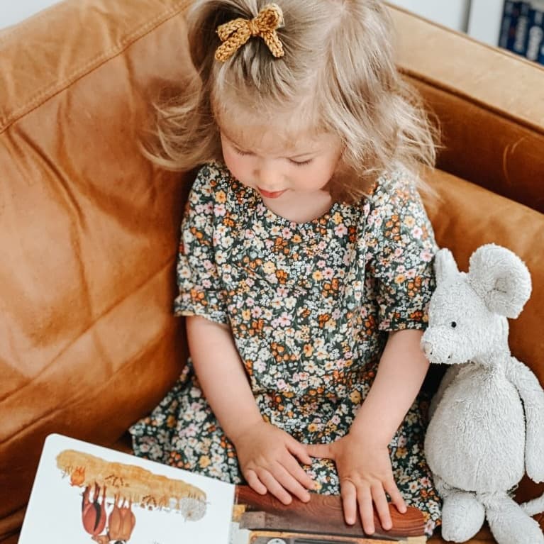 A child reading a personalized book